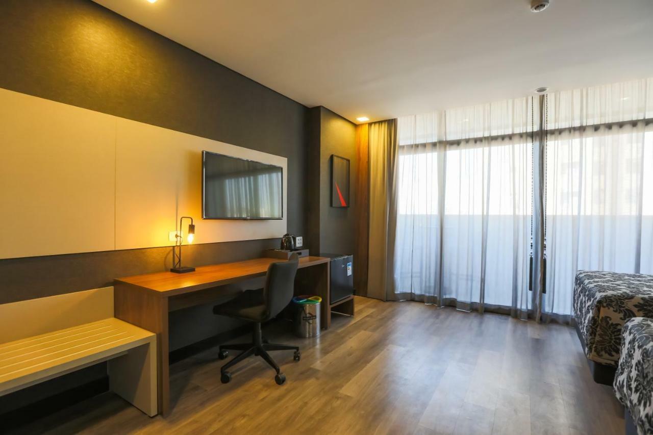 Ramada Hotel & Suites Озаску Экстерьер фото