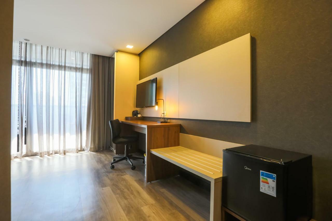 Ramada Hotel & Suites Озаску Экстерьер фото