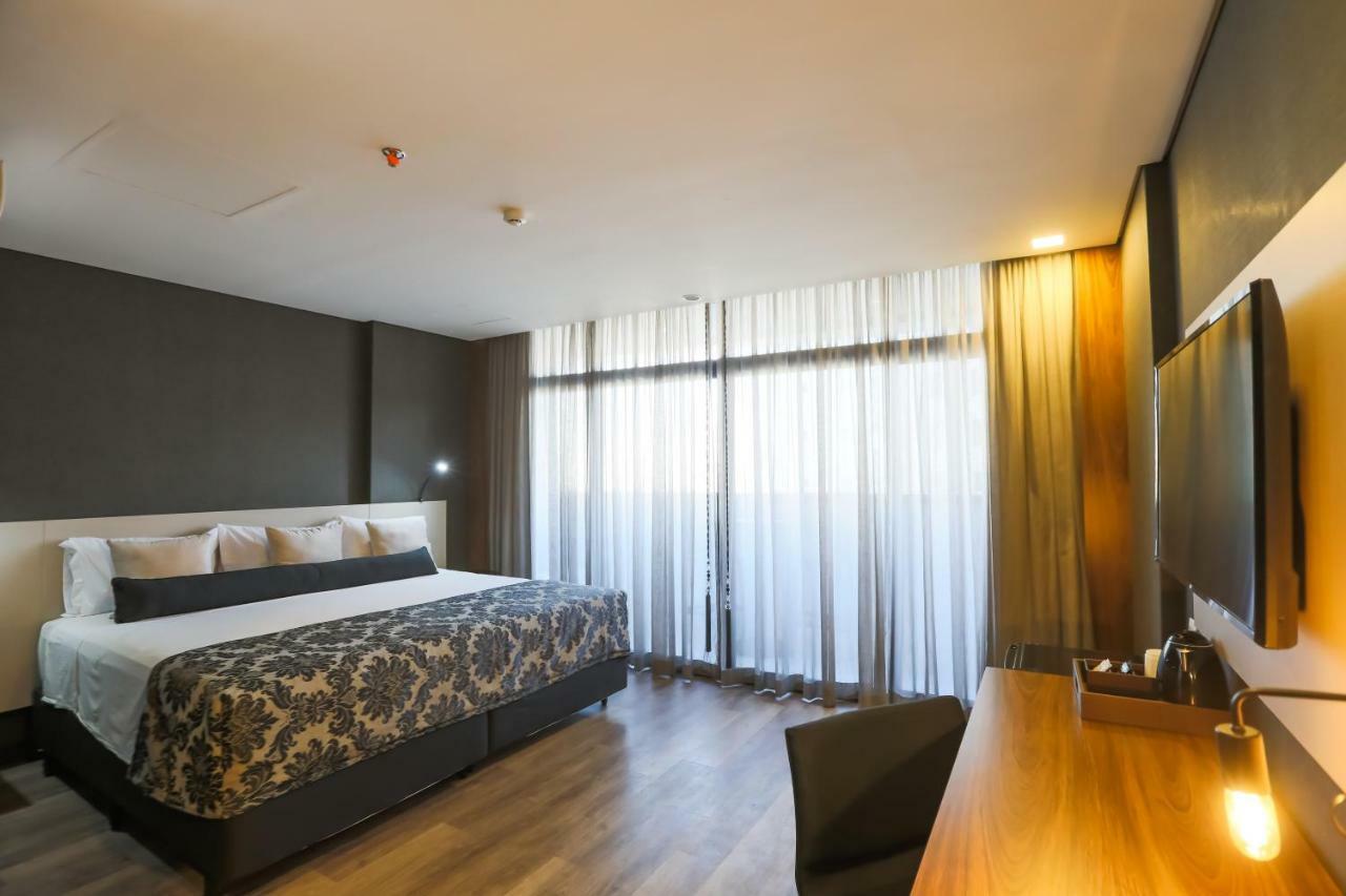 Ramada Hotel & Suites Озаску Экстерьер фото