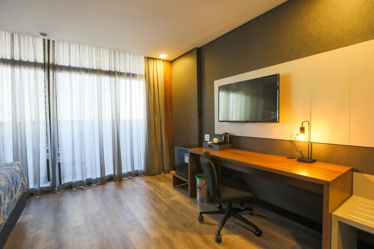 Ramada Hotel & Suites Озаску Экстерьер фото