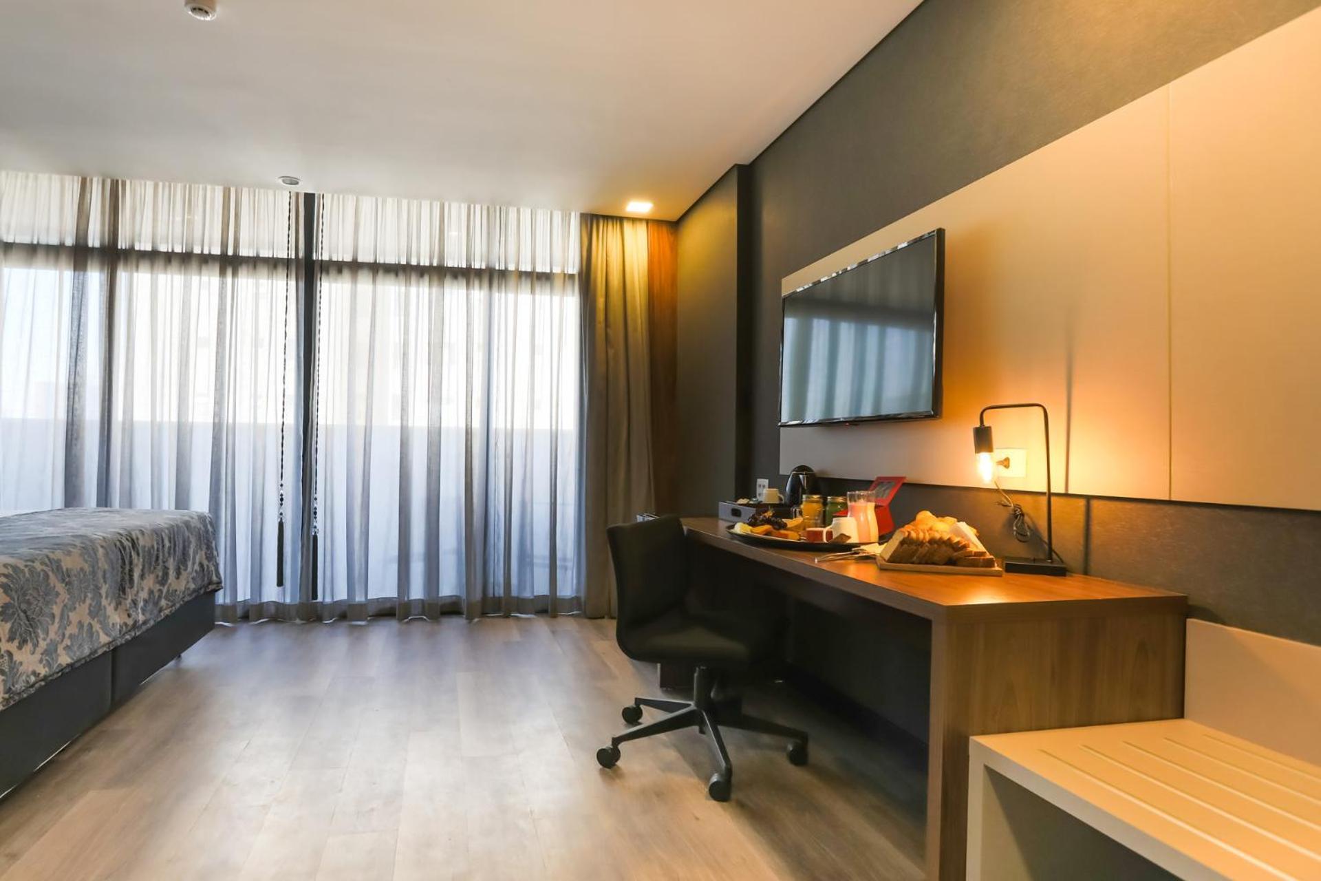 Ramada Hotel & Suites Озаску Экстерьер фото